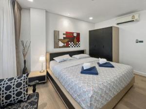 Postel nebo postele na pokoji v ubytování Mykonos Hua Hin - 1 bdr Condo Shared Pool Downtown + 23 fotografií