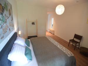 Ένα ή περισσότερα κρεβάτια σε δωμάτιο στο Country House in a hotel atmosphere with Sauna in Swolgen