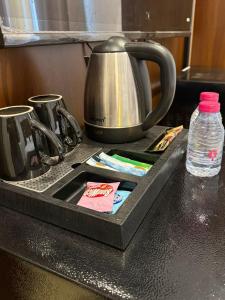 Παροχές για τσάι/καφέ στο شقة فخمة مع جلسة خارجية - Self Entry