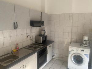 Kuchyň nebo kuchyňský kout v ubytování Villa Minden City