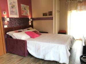 Postel nebo postele na pokoji v ubytování Milano B&B