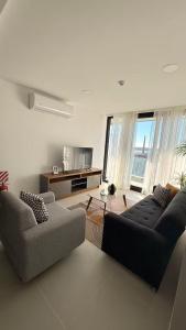 Imagine din galeria proprietății Vivo Costanera frente a la playa San José de Encarnación! Apartamento de 2 Habitaciones în Encarnación