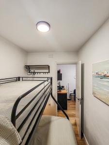 a bedroom with a bed and a view of the ocean at Pettit Lion in Villena