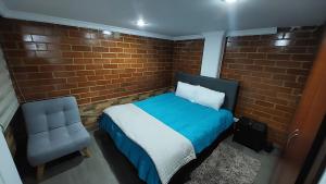 Una cama o camas en una habitación de Apartamento para descansar 2