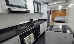 Una cocina o kitchenette en Apartamento para descansar 2 10 fotos más