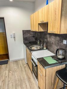 Køkken eller tekøkken på Gniezno centrum Łubieńskiego