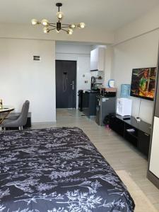 Η κουζίνα ή μικρή κουζίνα στο Quick Connect Studio Kileleshwa +28 φωτογραφίες