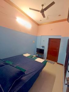 En eller flere senge i et værelse på Le Casa Stay