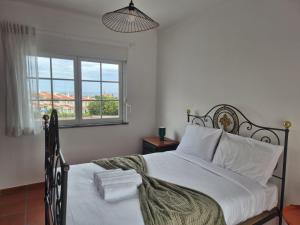 Postel nebo postele na pokoji v ubytování Casa Arreyal + 7 fotografií