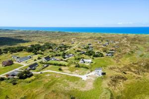 an aerial view of a house on a hill near the ocean at 302-Snedsted-Klitfogedvej-7 in Snedsted