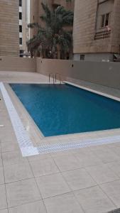 Πισίνα στο ή κοντά στο ماجيك سويت السالمية 33 Magic Suite AlSalmiya 33