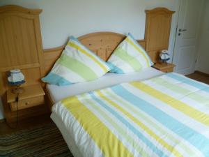 Postel nebo postele na pokoji v ubytování Bayerisch Wohnen