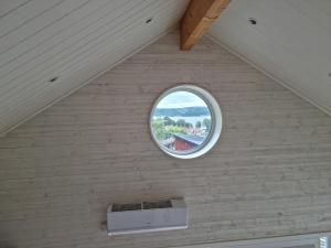 an overhead view of a window in a attic at Modern Cottage with Sea View in Svanesund SE09151 in Svanesund