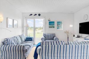 TV a/nebo společenská místnost v ubytování 110-Vestervig-Svanholmvej-10