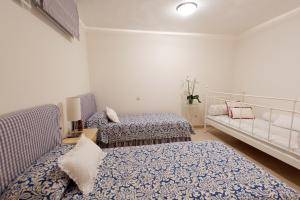 Postel nebo postele na pokoji v ubytování Chalet adosado en Pasito BM17