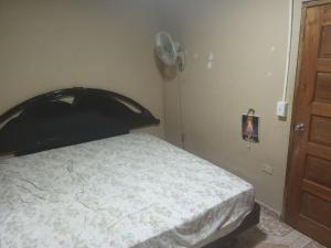 Giường trong phòng chung tại Finca Apolonia