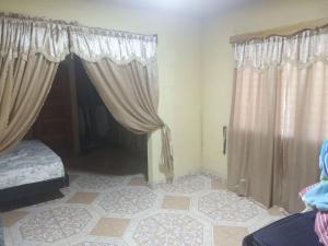 Postel nebo postele na pokoji v ubytování Finca Apolonia