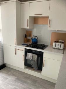 Køkken eller tekøkken på The Bonnie Stay Garden Apartment