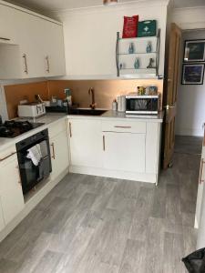 Køkken eller tekøkken på The Bonnie Stay Garden Apartment