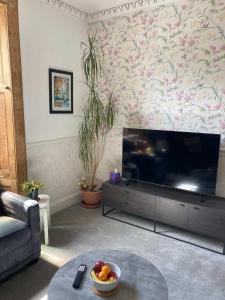 Et opholdsområde på The Bonnie Stay Garden Apartment