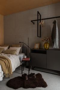 Ένα ή περισσότερα κρεβάτια σε δωμάτιο στο Forest Stodoły