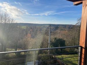 a view of the mountains from a balcony at SkyNest in Namur +11 photos