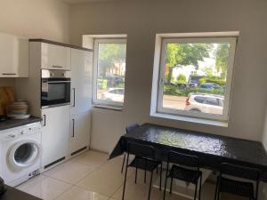 Kuchyň nebo kuchyňský kout v ubytování Villa Minden