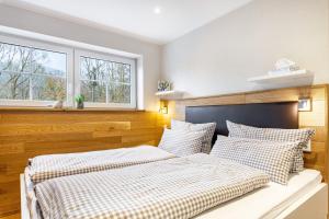Postel nebo postele na pokoji v ubytování Ferienwohnungen Vogelsang