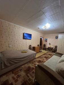 Postel nebo postele na pokoji v ubytování Апартаменти на Клосовського