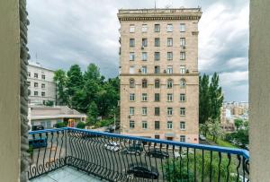 a view from a balcony of a tall building at Three bedroom, 8 Lyuteranska str, Centre of Kiev in Kyiv