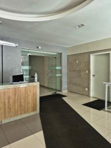 an office with a lobby with a reception desk at Ipanema Charm and Luxury in Rio de Janeiro
