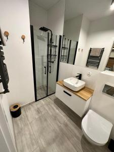 Ένα μπάνιο στο Przystań Dębki