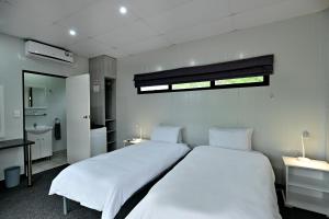 Postel nebo postele na pokoji v ubytování SleepOver Orpen Gate + 116 fotografií