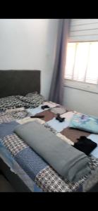 Ένα ή περισσότερα κρεβάτια σε δωμάτιο στο Apartamento beira mar