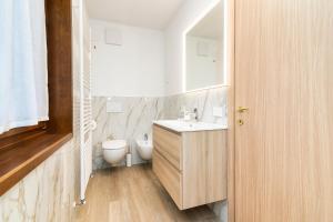 Un baño de Larice&Ribes Apartments 19 fotos más