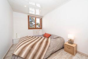 Una cama o camas en una habitación de Panorama des Cimes - T3 avec Sauna privé et Vue imprenable sur la Station