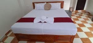 Postel nebo postele na pokoji v ubytování RB Tourist Home + 4 fotografie