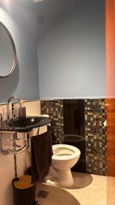 Et badeværelse på Departamento entero Lumará + 12 billeder