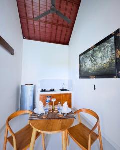 Μια τηλεόραση ή/και κέντρο ψυχαγωγίας στο Puri Diamond Villas +55 φωτογραφίες