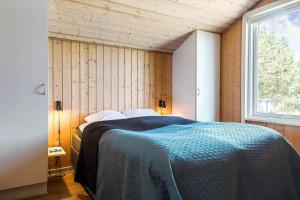 Ένα ή περισσότερα κρεβάτια σε δωμάτιο στο 209-Vestervig-Isfuglevej-15