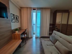 Μια τηλεόραση ή/και κέντρο ψυχαγωγίας στο Suíte 408 Cond VISTA AZUL