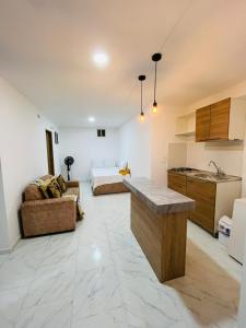 Kuchyň nebo kuchyňský kout v ubytování Nº 302 Aparta vacacional Doradal + 74 fotografií