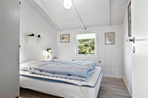 Ένα ή περισσότερα κρεβάτια σε δωμάτιο στο 538-Thisted-Klemsvej-26-A