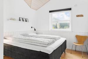 Rúm í herbergi á 1050-Thisted-Spanggardsvej-5