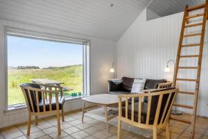 Un lugar para sentarse en 957-Thisted-Hvidbakken-33-Lille-hus