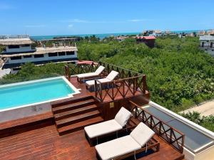 Bazén v ubytování sunsteps casa holbox nebo v jeho okolí