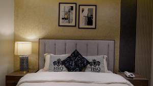 En eller flere senge i et værelse på HSQ Towers