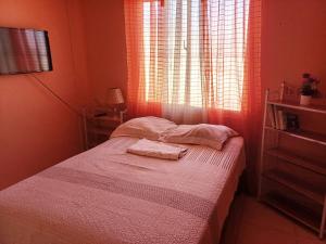 Katil atau katil-katil dalam bilik di Dona Beba Guesthouse