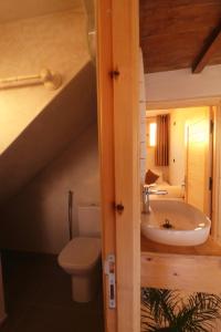 Koupelna v ubytování hyle Surfhouse