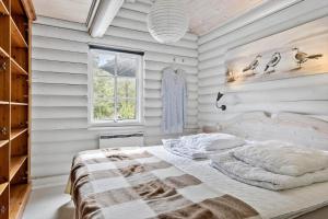 Ένα ή περισσότερα κρεβάτια σε δωμάτιο στο 997-Thisted-Lyngstien-15-B